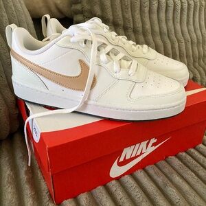 Nike Kids White Sneakers with Tan Swoosh Accent
